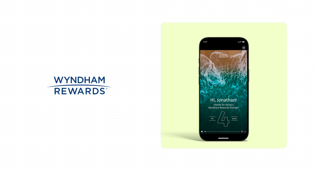 Wyndham Rewards case study card with the Wyndham Rewards wordmark beside a phone playing an ocean wave frame that greets Hi, Jonathan.